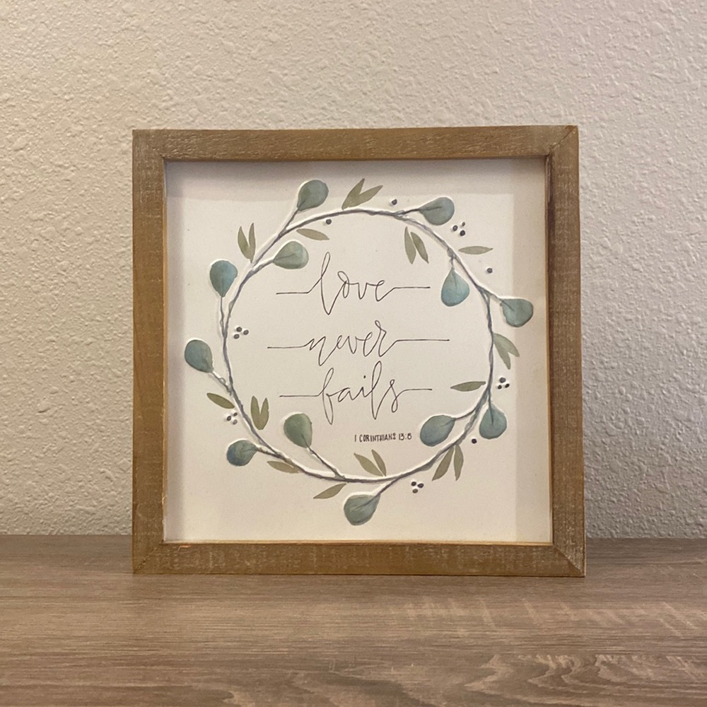 Love Never Fails Wall Decor